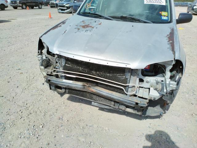 Photo 9 from auction – 2004 MAZDA TRIBUTE LX with VIN 4F2YZ04174KM33109