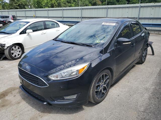 Photo 2 from auction – 2016 FORD FOCUS SE with VIN 1FADP3F21GL354132
