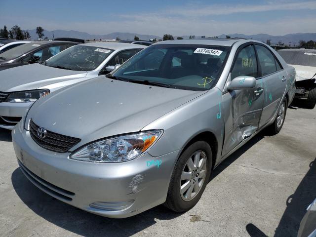 Photo 2 from auction – 2004 TOYOTA CAMRY LE with VIN 4T1BF30K94U578781