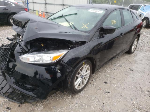 Photo 2 from auction – 2018 FORD FOCUS SE with VIN 1FADP3F21JL207803