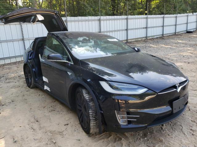 TESLA MODEL X 2016 with VIN 5YJXCBE21GF013475 - Photo from auction
