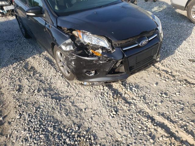 Foto 9 de la subasta – 2014 FORD FOCUS SE con VIN 1FADP3K28EL309191