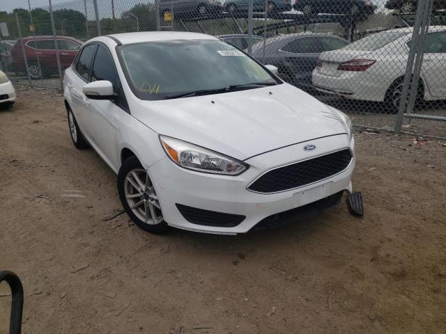 FORD FOCUS SE 2017 with VIN 1FADP3F25HL223741 - Photo from auction
