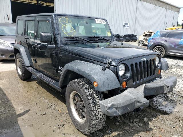 JEEP WRANGLER U 2009 with VIN 1J4GA39129L758453 - Photo from auction