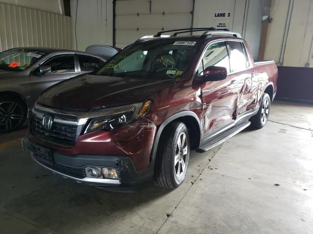 Photo 2 from auction – 2019 HONDA RIDGELINE with VIN 5FPYK3F76KB028335