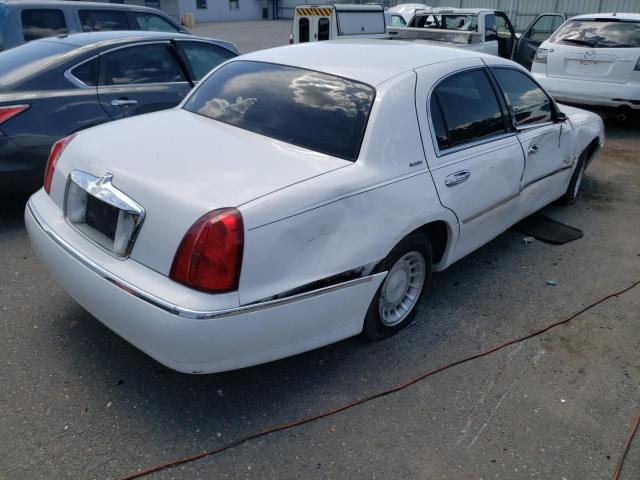 Photo 4 from auction – 2001 LINCOLN TOWN CAR E with VIN 1LNHM81W31Y680127