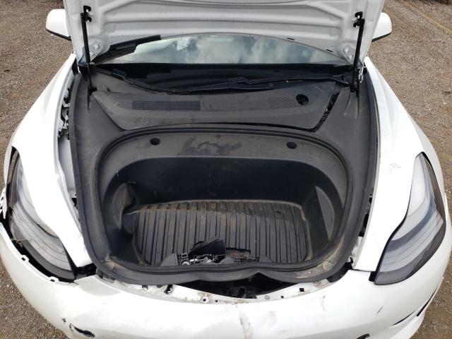 Photo 7 from auction – 2021 TESLA MODEL 3 with VIN 5YJ3E1EA8MF976542