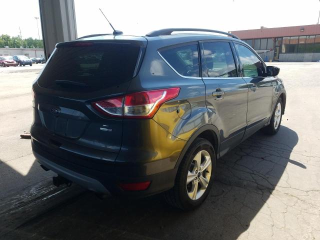 Photo 4 from auction – 2016 FORD ESCAPE SE with VIN 1FMCU9G98GUB57719