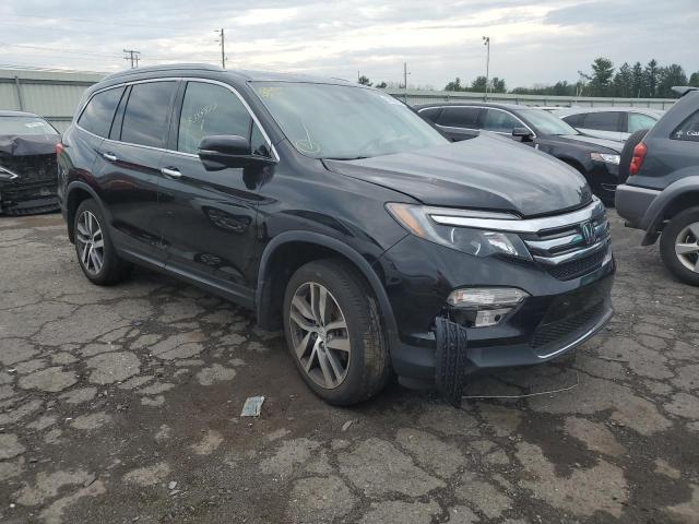 HONDA PILOT TOUR 2017 with VIN 5FNYF6H91HB061233 - Photo from auction