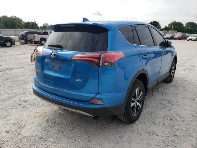 Photo 4 from auction – 2017 TOYOTA RAV4 XLE with VIN JTMWFREV1HD107242