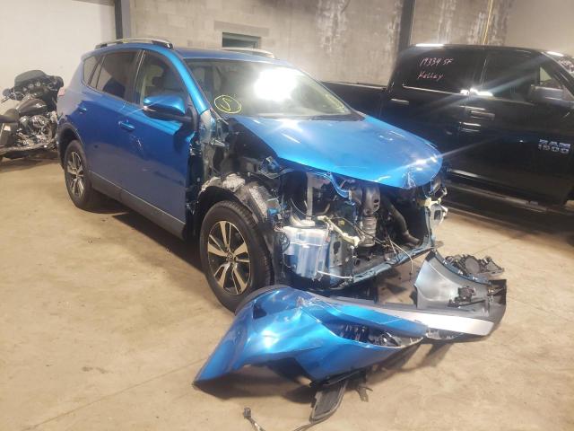 TOYOTA RAV4 XLE 2017 with VIN JTMRFREVXHJ137256 - Photo from auction