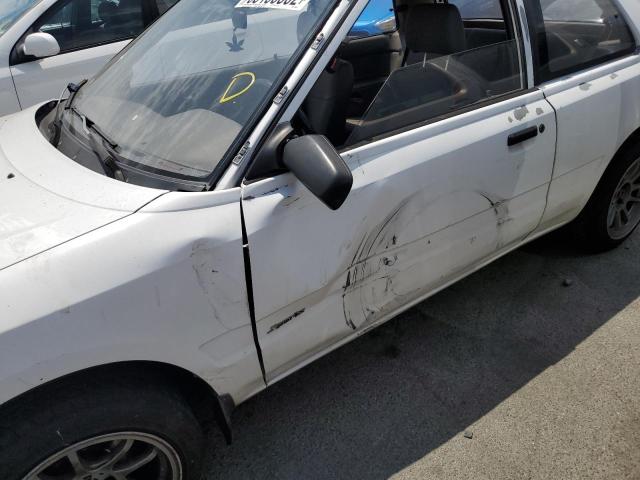 Photo 9 from auction – 1993 MAZDA 323 with VIN JM1BG2344P0588641
