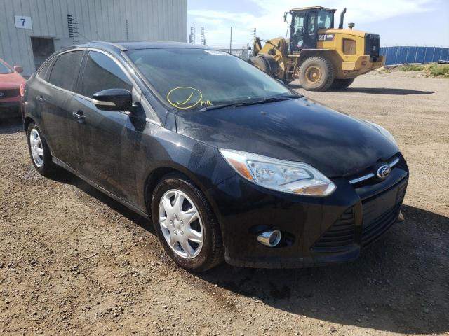 FORD FOCUS SE 2014 with VIN 1FADP3F21EL267666 - Photo from auction