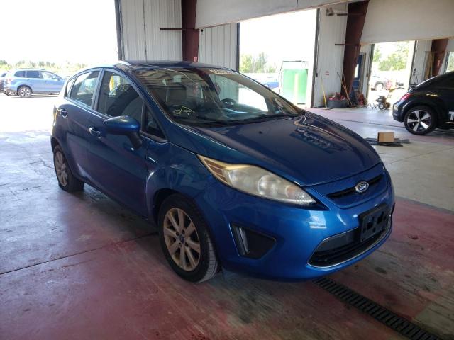 FORD FIESTA SE 2011 with VIN 3FADP4EJ2BM232790 - Photo from auction