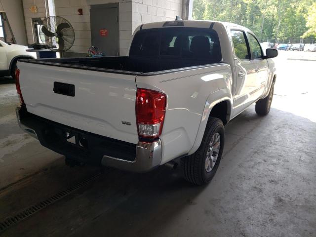 Photo 4 from auction – 2016 TOYOTA TACOMA DOU with VIN 3TMAZ5CN9GM009771