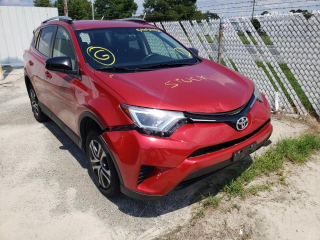 TOYOTA RAV4 LE 2016 with VIN JTMZFREV2GJ061563 - Photo from auction