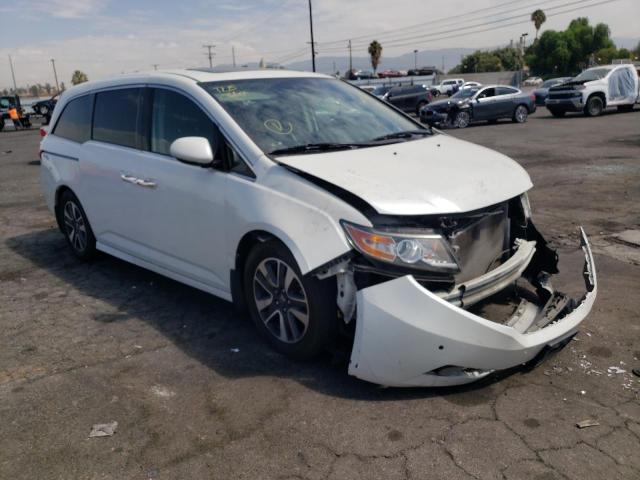 HONDA ODYSSEY TO 2014 with VIN 5FNRL5H98EB068943 - Photo from auction
