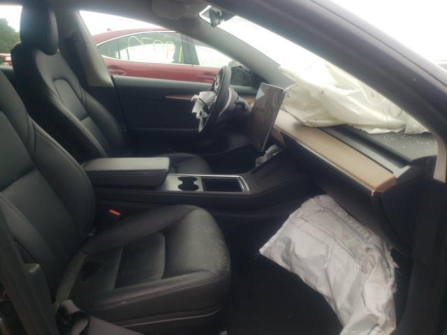 Photo 5 from auction – 2021 TESLA MODEL 3 with VIN 5YJ3E1EA3MF090371