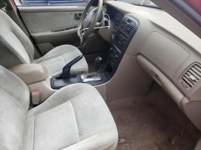 Photo 5 from auction – 2004 KIA OPTIMA LX with VIN KNAGD126245307718
