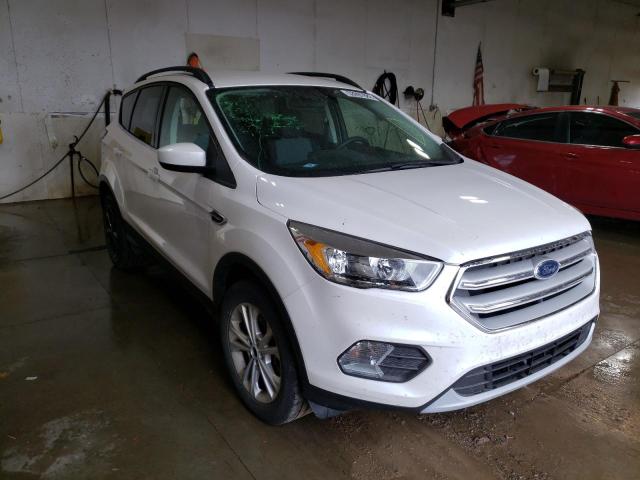 FORD ESCAPE SE 2018 with VIN 1FMCU9GD8JUA90972 - Photo from auction
