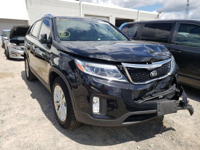 KIA SORENTO EX 2015 with VIN 5XYKUDA77FG558687 - Photo from auction