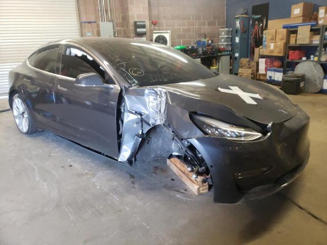 TESLA MODEL 3 2018 with VIN 5YJ3E1EB2JF105771 - Photo from auction