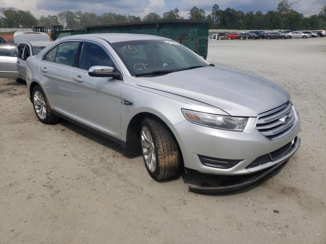 FORD TAURUS LIM 2014 with VIN 1FAHP2F89EG135022 - Photo from auction
