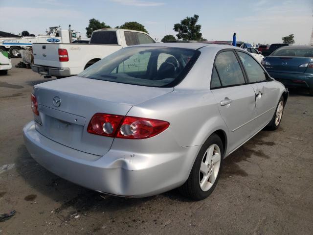 Photo 4 from auction – 2003 MAZDA 323 with VIN 1YVFP80C435M40111