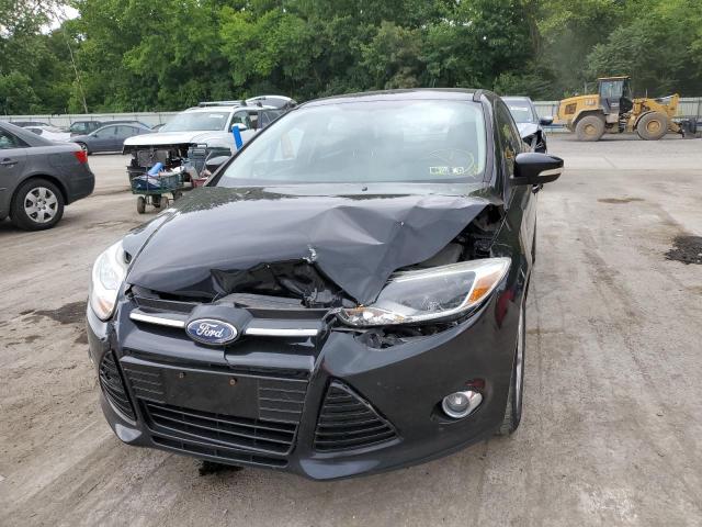 Photo 9 from auction – 2012 FORD FOCUS SE with VIN 1FAHP3F28CL214526