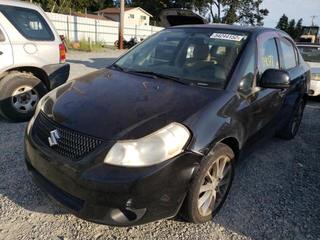 Photo 2 from auction – 2011 SUZUKI SX4 LE with VIN JS2YC5A27B6300938