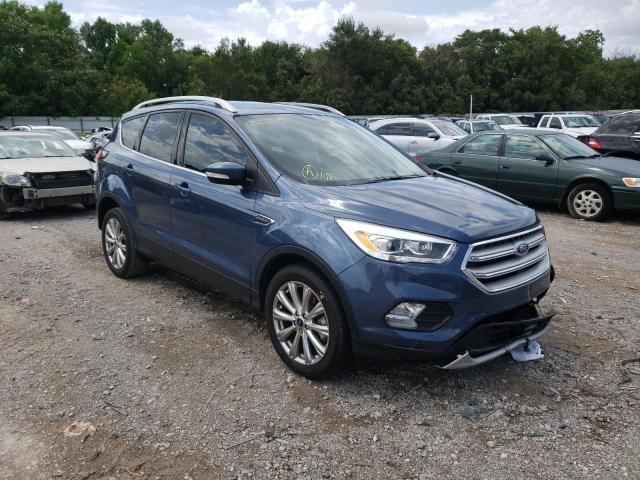 FORD ESCAPE TIT 2018 with VIN 1FMCU0J94JUB23319 - Photo from auction