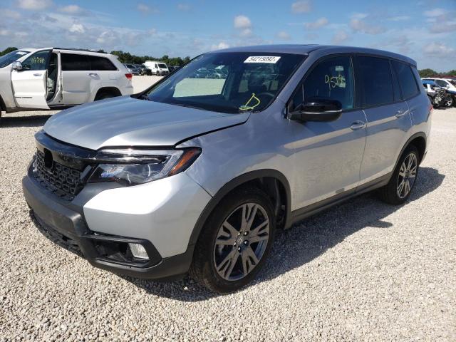 Photo 2 from auction – 2021 HONDA PASSPORT E with VIN 5FNYF7H52MB005671