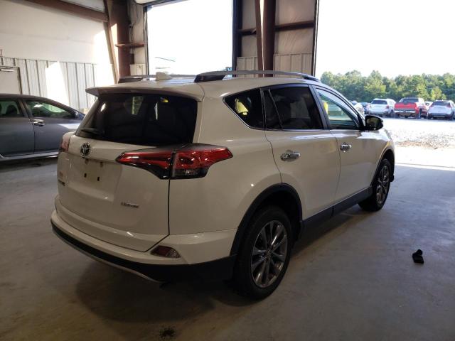Photo 4 from auction – 2018 TOYOTA RAV4 LIMIT with VIN JTMYFREV4JJ190083