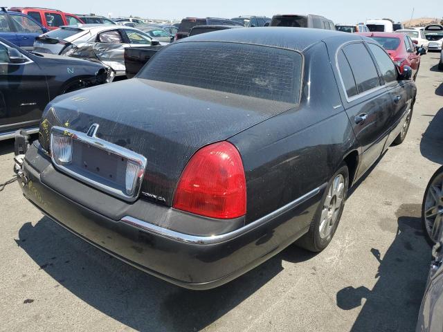 Photo 4 from auction – 2005 LINCOLN TOWN CAR E with VIN 1LNHM84W45Y619144