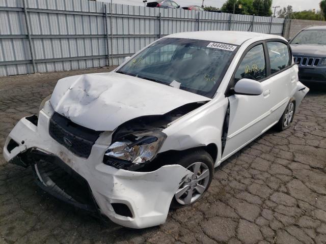 Photo 2 from auction – 2011 KIA RIO BASE with VIN KNADH4A31B6960614