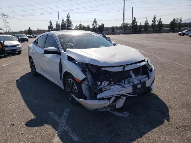 HONDA CIVIC EX 2018 with VIN 2HGFC1E31JH644244 - Photo from auction