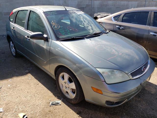 FORD FOCUS ZX5 2005 with VIN 3FAFP37N85R128802 - Photo from auction