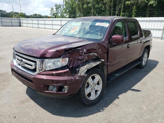 Photo 2 from auction – 2010 HONDA RIDGELINE with VIN 5FPYK1F59AB004211