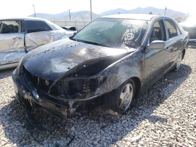 Photo 2 from auction – 2003 TOYOTA CAMRY LE with VIN 4T1BF32K33U560093