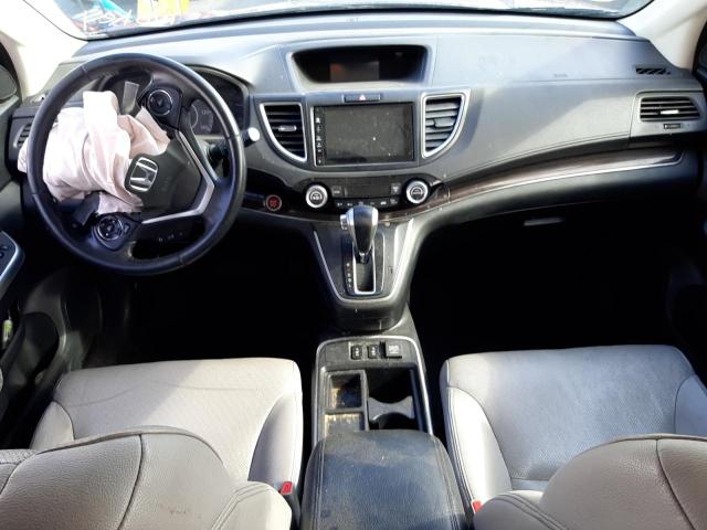 Photo 9 from auction – 2015 HONDA CR-V EXL with VIN 2HKRM4H77FH632459