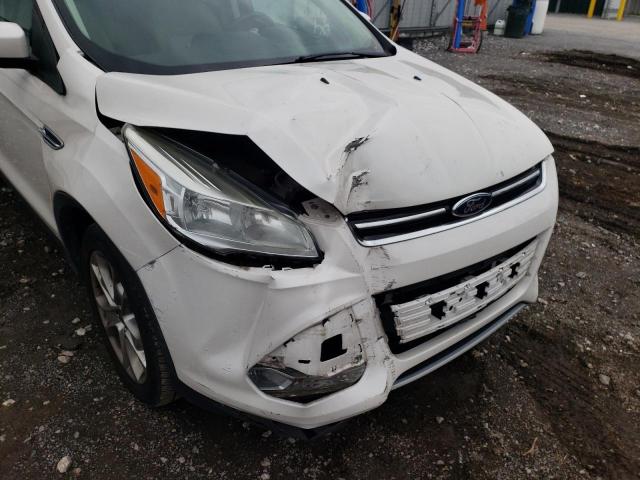 Photo 9 from auction – 2014 FORD ESCAPE TIT with VIN 1FMCU9J97EUA65653
