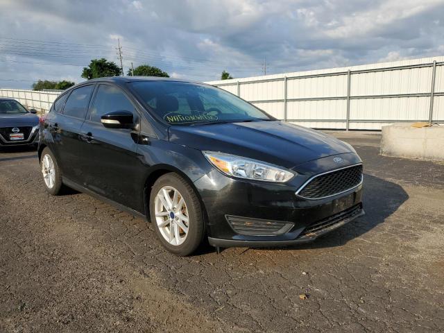 FORD FOCUS SE 2016 with VIN 1FADP3K28GL301885 - Photo from auction