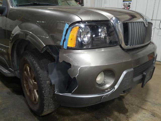 Photo 9 from auction – 2004 LINCOLN NAVIGATOR with VIN 5LMFU28R74LJ23532