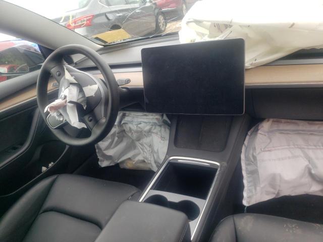 Photo 9 from auction – 2021 TESLA MODEL 3 with VIN 5YJ3E1EA3MF090371