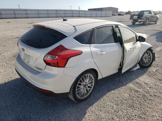 Photo 4 from auction – 2014 FORD FOCUS TITA with VIN 1FADP3N26EL460610
