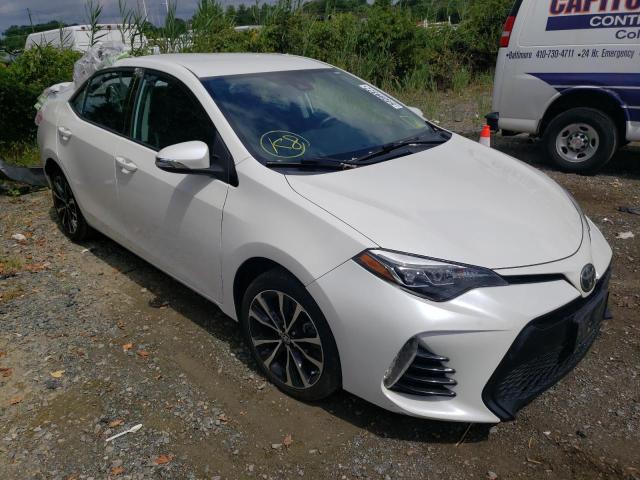 TOYOTA COROLLA L 2017 with VIN 5YFBURHE9HP634927 - Photo from auction