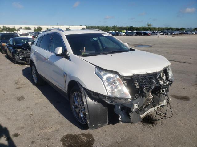 CADILLAC SRX PERFOR 2014 with VIN 3GYFNCE39ES677154 - Photo from auction