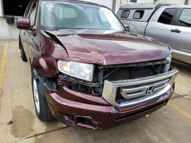 Photo 9 from auction – 2011 HONDA RIDGELINE with VIN 5FPYK1F5XBB007488