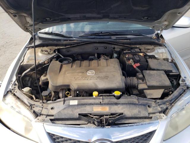 Photo 7 from auction – 2003 MAZDA 323 with VIN 1YVFP80C435M40111
