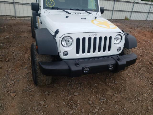 Photo 9 from auction – 2015 JEEP WRANGLER U with VIN 1C4BJWDG5FL619121
